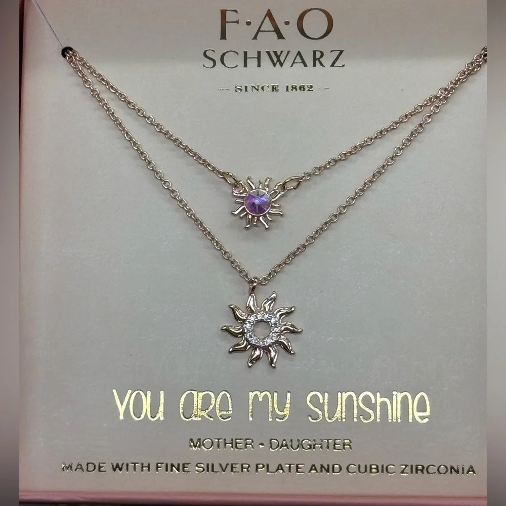 FAO Schwarz Crystal Sun Pendant 2 Pc Necklace Set